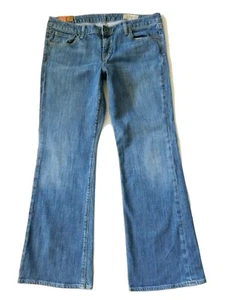 Pantalones de mezclilla GAP 1969 acampanados tiro bajo para mujer talla 12A elásticos al tobillo lavado medio - Imagen 1 de 6