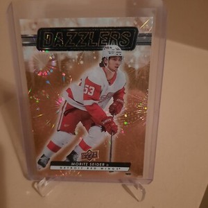 2023-24 Upper Deck Series 1 " ORANGE DAZZLERS " MORITZ SEIDER Card# DZ-50