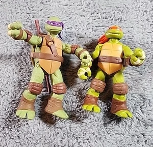 2012 Teenage Mutant Ninja Turtles Donatello & Michelangelo Actionfiguren 4,5" - Bild 1 von 7