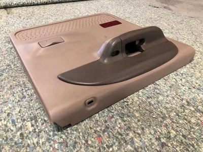 Panel de puerta trasero izquierdo doble cabina marrón tostado Ford F250 Super Duty 99 usado (8X) Foto 1 de 4