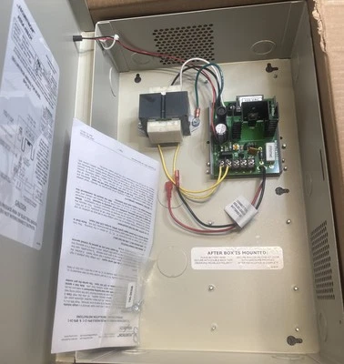 NIB Securitron BPS-24-1 Power Supply, 24VDC 1A, w/ Enclosure, Regulated,Filtered - Image 1 of 4