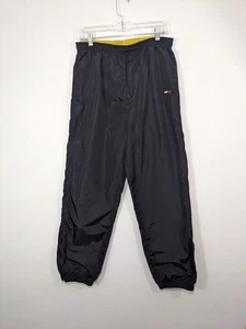 Vintage Tommy Hilfiger Athletics Windbreaker Nylon Hose Herren Gr. L schwarz 90s Logo - Bild 1 von 15