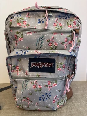 Mochila Jansport gris rosa con flores parte inferior de cuero sintético Foto 1 de 4