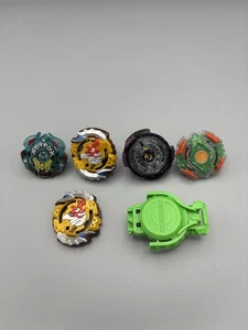 Beyblades Lot of 4 Spinners and 1 Launchers Metal Plastic Takara Tomy Hasbro EUC - Bild 1 von 12
