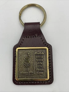 Vintage 1996 Olympics Kodak Official Sponsor Keychain Leather Brass - Picture 1 of 7