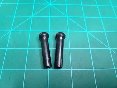 1986-1996 Mitsubishi Mighty Max Pickup OEM Pull Up/Push Down Door Lock Knobs    - Image 1 of 3