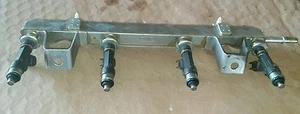  #128......2007 FORD FUSION 2.3 FUEL INJECTORS & RAIL SET. - Picture 1 of 4