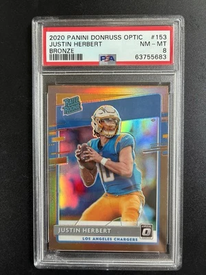 Justin Herbert PSA 8 RC 2020 Panini Donruss Optic Bronze Prizm Rated Rookie #153 - Image 1 of 2