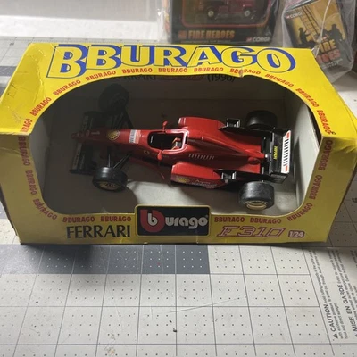 DIE CAST 1/24 " FERRARI F 310 - 1996" (COD. 6501) BURAGO - Imagem 1 de 4