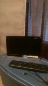 HP black all-in-one desktop computer - Picture 1 of 4