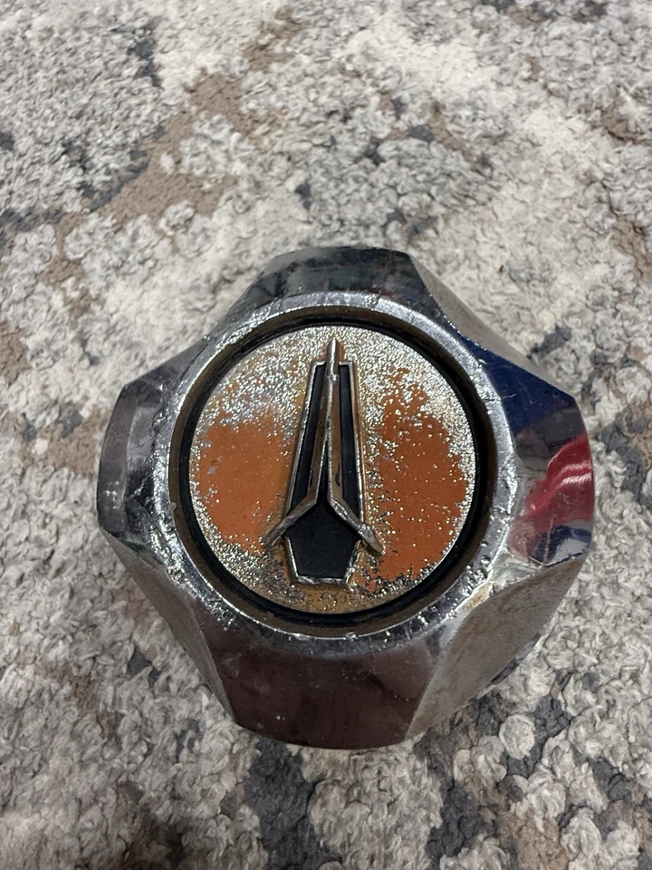 Tapacubos centrales Plymouth Arrow Champ años 70 Foto 1 de 4