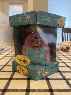 Furby Babies 2000 edición especial limitada "primavera" ojos morados #70-951 nuevo sellado Foto 1 de 4