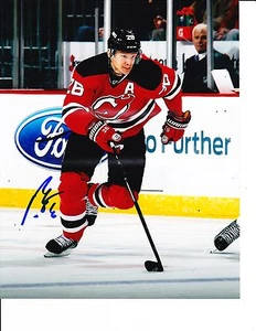 NEW JERSEY DEVILS PATRIK ELIAS SIGNED RED JERSEY 8X10 - Picture 1 of 1