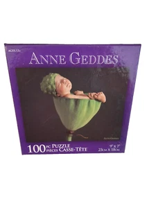 Anne Geddes 100 Piece Puzzle 9x7 Sleeping Baby Green Flower Pod- Sealed - Picture 1 of 2
