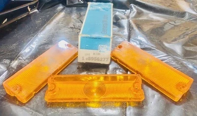 Impala 1965-66 NOS 3 luz de estacionamiento delantera lente #5956277 GM original Foto 1 de 3