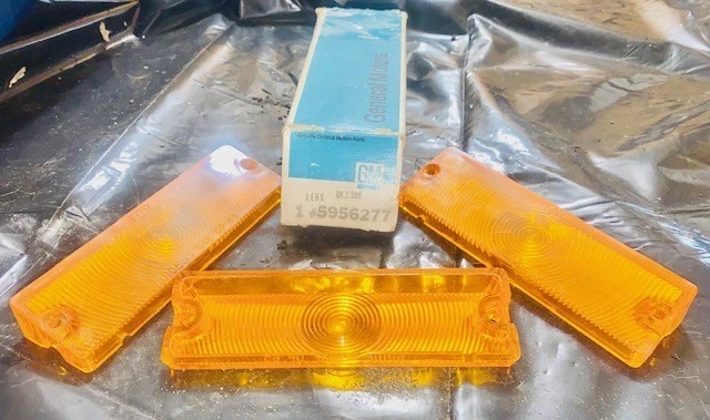 Impala 1965-66 NOS 3 luz de estacionamiento delantera lente #5956277 GM original Foto 1 de 3
