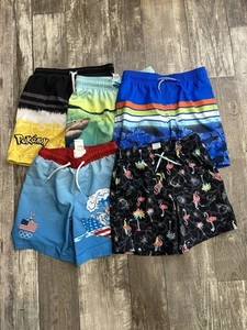 Costumi da bagno/bauli da bambino assortiti - Pokemon, a righe, stampe fenicotteri - tutte le taglie 8 - Foto 1 di 16