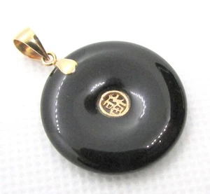 CIONDOLO CIAMBELLA ONICE NERA CINESE ORO GIALLO 10 KT 34X25MM - 4,1G - Foto 1 di 4