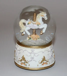 Nostalgische Schneekugel mit Spieluhr mit Karussellpferd - Bild 1 von 3