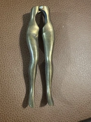 Vintage Kitschy Nutcracker Sexy Legs Bronze? Brass? - Image 1 of 4