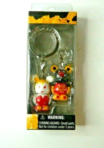 Disney Vinylmation Jr. Paar 2 Schlüsselanhänger Tinkerbell & Stern Nieten Design - Bild 1 von 3