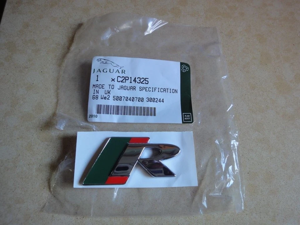 JAGUAR XF XFR XK XKR S Tipo R BAÚL BOTA ALA INSIGNIA EMBLEMA NUEVO GENUINO Foto 1 de 1