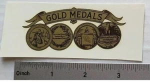 (1) GOLD MEDALS ANTIQUE SCALE & COIN MACHINE DECALS #S-24 SMALL 3 1/4" GOLD - Picture 1 of 2