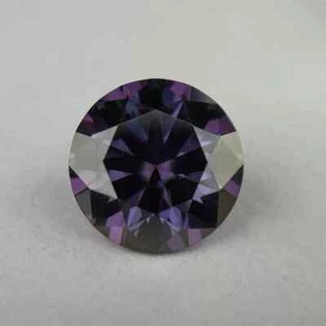 3.5mm 0.20ct Round purple in Color VVS1 Moissanite. - Picture 1 of 1