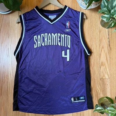 Camiseta deportiva vintage para niños Sacramento Kings Chris Webber #4 NBA Reebok - grande Foto 1 de 4