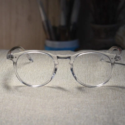 Monturas de gafas redondas de acetato transparente para hombre Gafas de acetato de cristal para mujer Foto 1 de 4