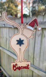 Divertido adorno de Navidad de madera con culo de gato - Humoroso Papá Noel gato vacaciones gato agujero - Imagen 1 de 1