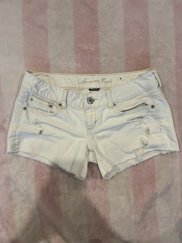 Pantalones cortos American Eagle elásticos blancos desgastados de mezclilla para mujer talla 4 Foto 1 de 4