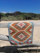 multi coloured rug wool