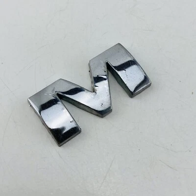 Dodge Magnum 2005-2008 emblema logotipo letra insignia puerta trasera cromada OEM E31M-2 Foto 1 de 4