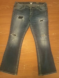 Silver Jeans Pioneer W36xL30 Low Rise Boot Cut Distressed Patch Löcher  - Bild 1 von 5