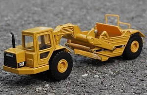 NORSCOT 1/64 Scale Cat Wheel Tractor 611 Scraper Diecast Car Model Toy 55308 - Picture 1 of 6