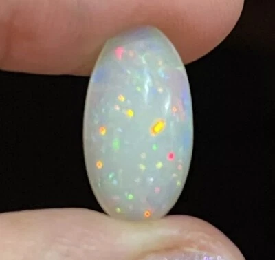 4.7ct 18x9.4x6mm Sparkling Stardust Oval Ethiopian Welo Opal Gemstone Loose Gem - Image 1 of 4