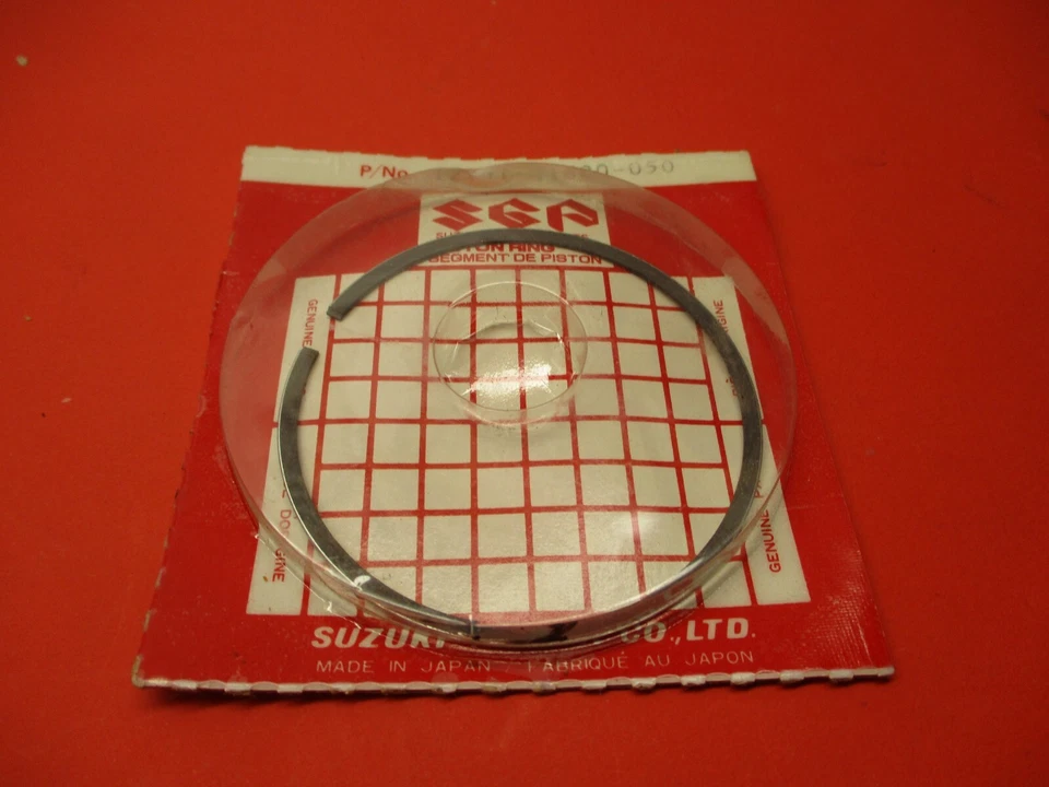 ANILLOS DE PISTÓN NUEVOS ORIGINALES SUZUKI RM250 RS250 PE250 .50 12141-41600-050 Foto 1 de 1