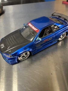 jada toys 1/24 Used Nissan Skyline R34 GTR Motorex  - Picture 1 of 6