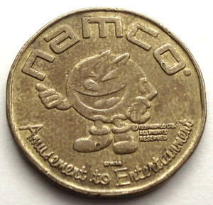 NAMCO AMUSEMENT TO ENTERTAINMENT 1991 Token 21.6mm 4g Brass. II1.2 - Picture 1 of 2