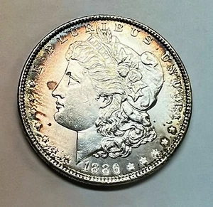 1886 Morgan Silver Dollar BU Mint Luster With Toning - Picture 1 of 3