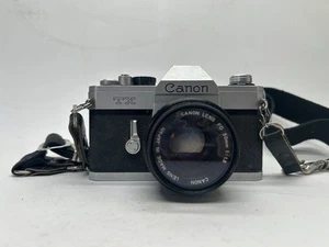 Canon TX 35mm SLR Vintage Film Camera With 50mm Lens Mechanically Working - Picture 1 of 6