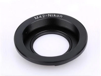 M42 focus to infinity lens adaptor to fit Nikon F mount camera body - UK SELLER - Image 1 of 4