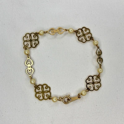 "Pulsera de San Valentín con corazones de flores de perlas sintéticas tono dorado AVON 7,25"" firmada de colección" Foto 1 de 3