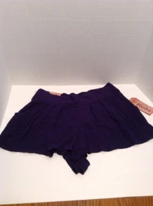 Falda Mudd Mini Transparente Rayón Sólido Azul $36 - Grande para Junior - Imagen 1 de 8
