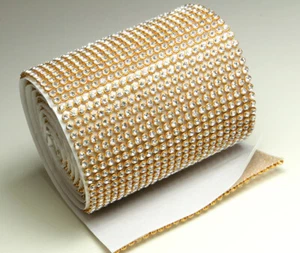 Cinta de pedrería de malla CRISTAL/ORO SS8 AUTOADHESIVA 7,8 cm 24 filas pedrería  - Imagen 1 de 42
