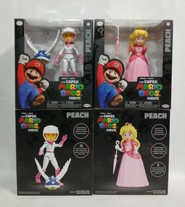 LOT of 2 Super Mario Bros. Movie - 5” Figure - Peach w/ Umbrella & Racer Peach - Picture 1 of 13