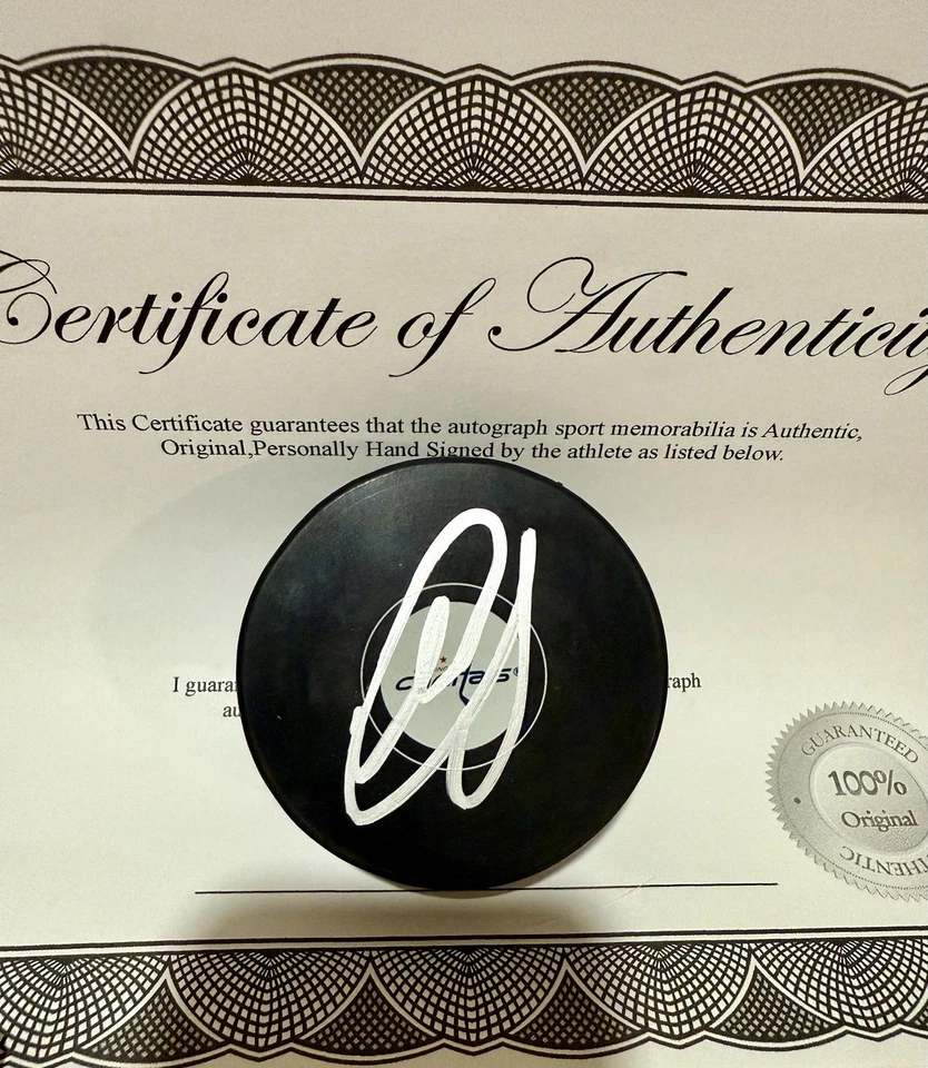 ALIAKSEI PROTAS SIGNED AUTOGRAPHED WASHINGTON CAPITALS HOCKEY PUCK W/ CASE COA - Image 1 of 1