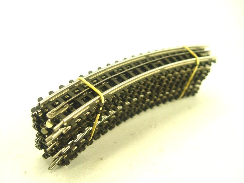 10 Stck. Gebogene    m. Pappschwellen  - Trix Express HO  - #185     gebr. - Bild 1 von 1