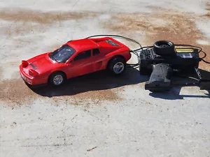 New Bright 1989 RC Ferrari Testarossa mit Kabelfernbedienung Vintage 1:18 - Bild 1 von 8